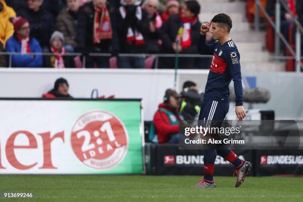 James Rodriguez of Bayern Muenchen celebrates after he scored a goal to make it 2:0 during the Bundesliga match between 1. FSV Mainz 05 and FC Bayern...