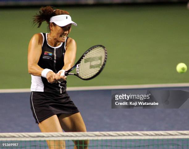 Ai Sugiyama of Japan returns against Francesca Schiavone of Italy and Alisa Kleybanova of Russia in her doubles final match with and Daniela...