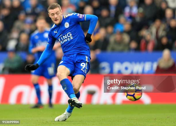 Jamie Vardy of Leicester City scores his sides first goGordon Reid of Scotland during the Premier League match between Leicester City and Swansea...