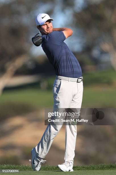 Harris English plays his shot from the fifth tee during the final round of the Farmers Insurance Open at Torrey Pines South on January 28, 2018 in...
