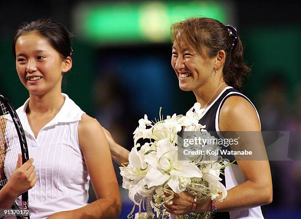 Ai Sugiyama of Japan smiles during a ceremony during day seven of the Toray Pan Pacific Open Tennis tournament at Ariake Colosseum on October 3, 2009...