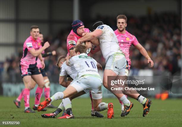 Thomas Waldrom of Exeter Chiefs takes on the Saracens defence during the Anglo-Welsh Cup match between Exeter Chiefs and Saracens at Sandy Park on...