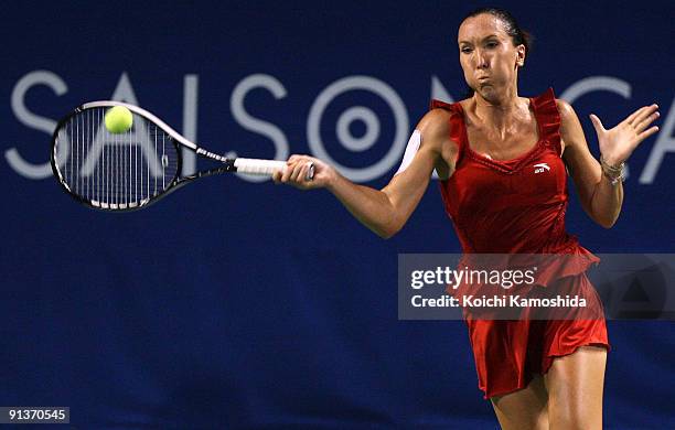 Jelena Jankovic of Serbia plays a forehand in the women's final match against Maria Sharapova of Russia during day seven of the Toray Pan Pacific...