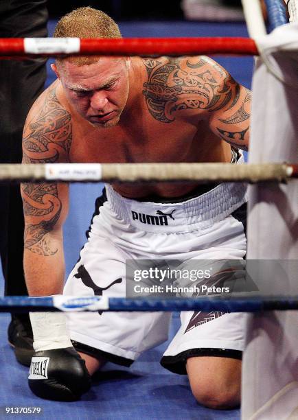 Shane Cameron is knocked out by David Tua during their heavyweight fight at Mystery Creek on October 3, 2009 in Hamilton, New Zealand.