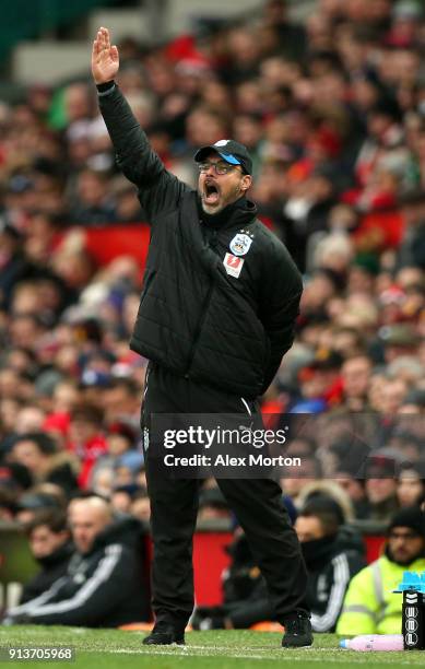 David Wagner, Manager of Huddersfield Town gives his team instructions during the Premier League match between Manchester United and Huddersfield...