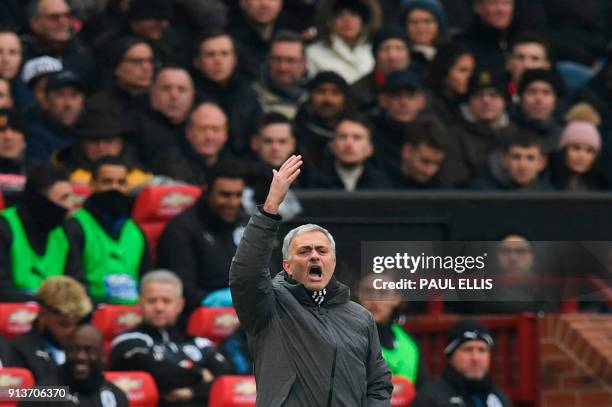 Manchester United's Portuguese manager Jose Mourinho gestures rom the touchline during the English Premier League football match between Manchester...