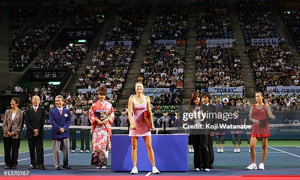 Maria Sharapova of Russia holds the trophy after beating Jelena Jankovic of Serbia in the final match during day seven of the Toray Pan Pacific Open...