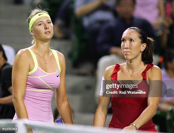 Maria Sharapova of Russia and Jelena Jankovic of Serbia meet at the net after the final match during day seven of the Toray Pan Pacific Open Tennis...