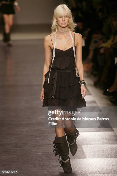 Model walks the runway during the Isabel Marant Spring Summer 2010 Pret a Porter show as part of the Paris Womenswear Fashion Week Spring/Summer 2010...