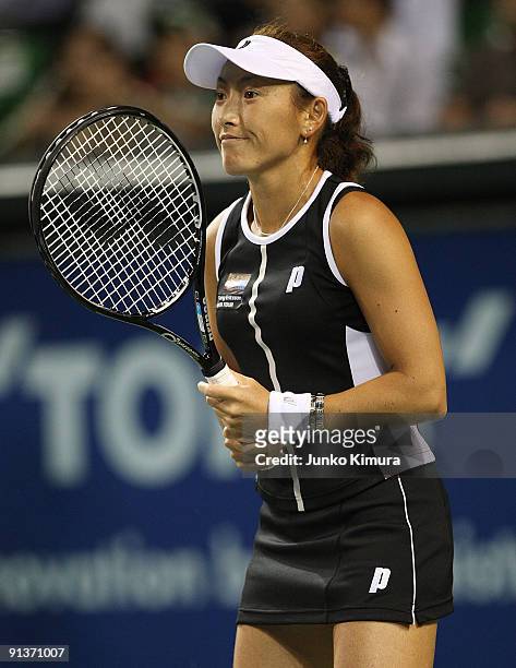 Ai Sugiyama of Japan warms up prior to her doubles final match with her partner Daniela Hantuchova of Slovakia against Francesca Schiavone of Italy...