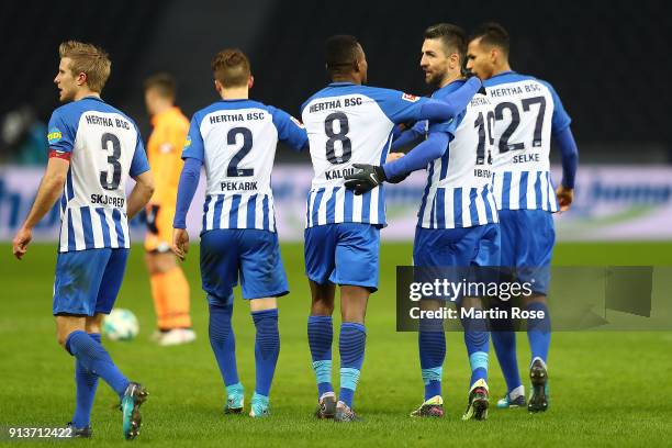 Salomon Kalou of Berlin celebrates with his team after he scored a goal to make it 1:1 during the Bundesliga match between Hertha BSC and TSG 1899...