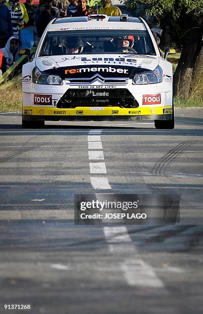 Norwegian Petter Solberg and his British co-pilot Phil Mills drive their Citroen during the second stage of the 45th Rally of Catalonia in El Molar...