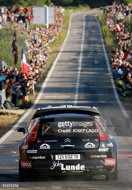 Norwegian Petter Solberg and his British co-driver Phil Mills drive their Citroen during the second stage of the 45th Rally of Catalonia in El Molar...