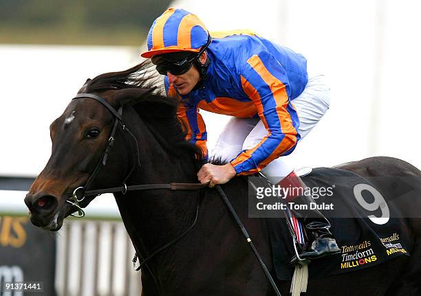Johnny Murtagh rides Lillie Langtry to win The Tattersalls Timeform Fillies' 800 at Newmarket Racecourse on October 3, 2009 in Newmarket, England.