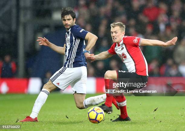 Claudio Yacob of West Bromwich Albion and James Ward-Prowse of Southampton chase the ball during the Premier League match between West Bromwich...