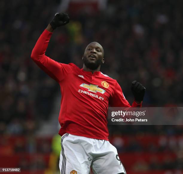 Romelu Lukaku of Manchester United celebrates scoring their first goal during the Premier League match between Manchester United and Huddersfield...