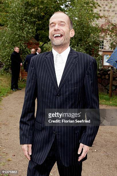 Georg Uecker arrives for the church wedding of Barbara Schoeneberger and Maximilian von Schierstaedt at the church of Rambow on October 3, 2009 in...
