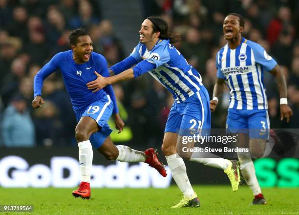 Jose Izquierdo of Brighton and Hove Albion celebrates scoring his side's second goal with Matias Ezequiel Schelotto and Gaetan Bong during the...