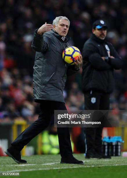 Jose Mourinho, Manager of Manchester United gives his team instructions during the Premier League match between Manchester United and Huddersfield...