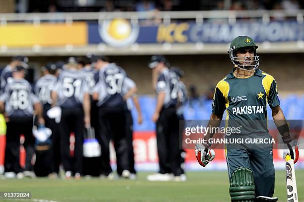 New Zealand team celebrates the dismissal of Pakistan batsman Imran Nazir during the ICC Champions Trophy semi final match between New Zealand and...