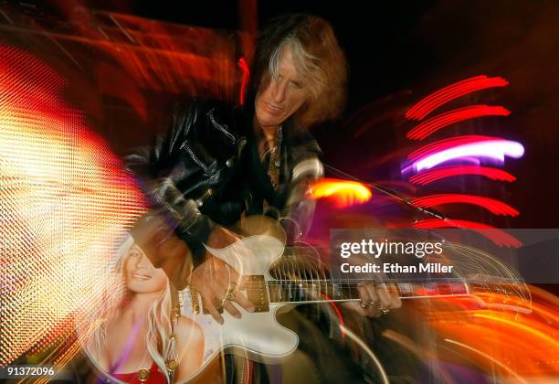 Aerosmith guitarist Joe Perry performs during a concert at the Bare Pool Lounge at The Mirage Hotel & Casino to celebrate the resort's 20th...