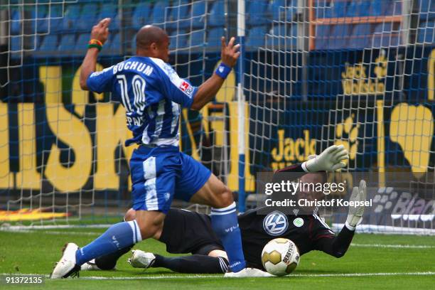 Diego Benaglio of Wolfsburg saves the ball against Joel Epallé of Bochum during the Bundesliga match between VFL Bochum and VfL Wolfsburg at...