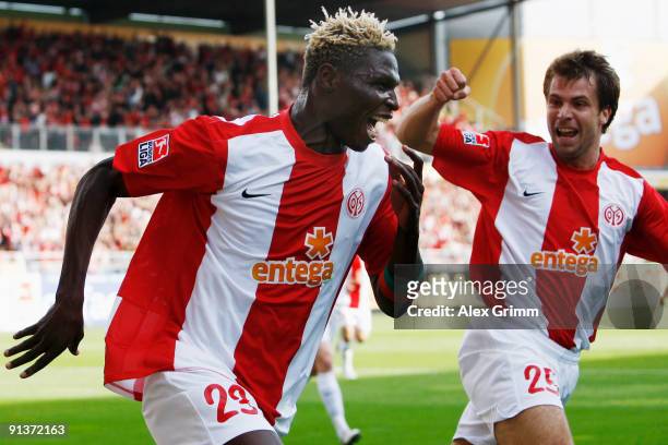 Aristide Bance of Mainz celebrates his team's second goal with team mate Andreas Ivanschitz during the Bundesliga match between FSV Mainz 05 and 1899...