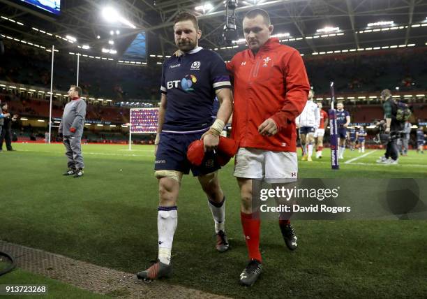 John Barclay of Scotland walks off with Ken Owens of Wales during the Natwest Six Nations round One match between Wales and Scotland at Principality...