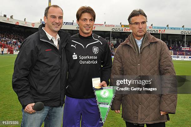 Johannis Kaufmann , Bjoern Lindemann of Osnabrueck and Helmut Sandrock during the Third Liga match between VfL Osnabrueck and SV Sandhausen at the...