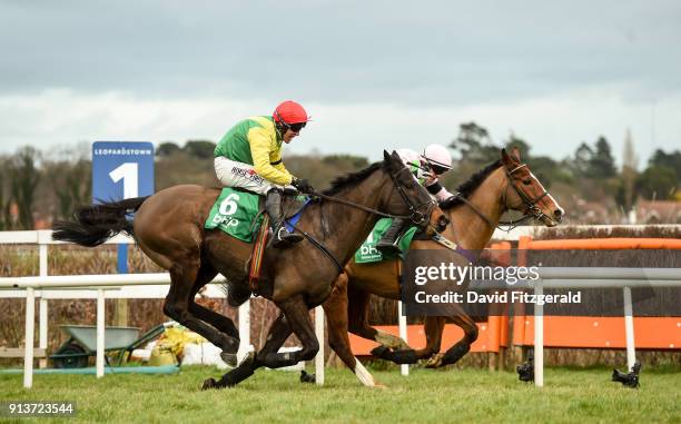 Dublin , Ireland - 3 February 2018; Supasundae, with Robbie Power up, left, races along the home straight next to Faugheen, with Paul Townend up, on...