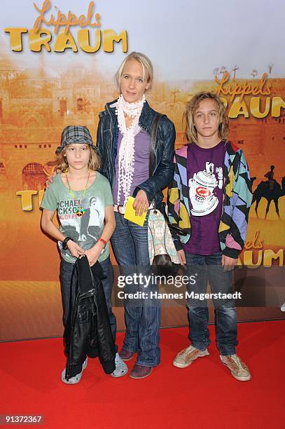 Annick Wecker with her kids Valentin and Tamino attend the premiere 'Lippels Traum' at the MaxxX Filmpalast on October 3, 2009 in Munich, Germany.