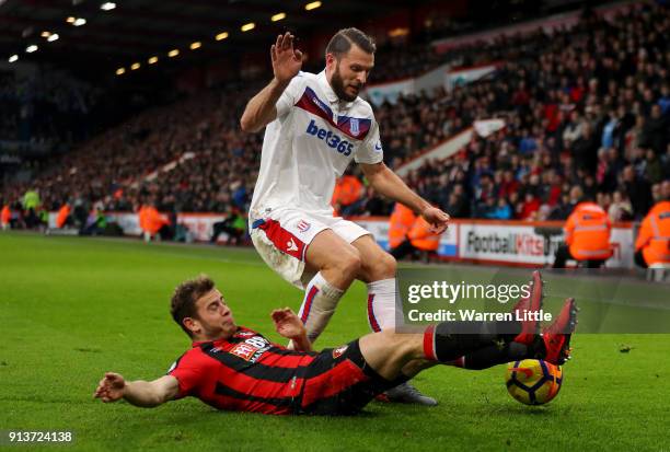 Ryan Fraser of AFC Bournemouth tackles Erik Pieters of Stoke City during the Premier League match between AFC Bournemouth and Stoke City at Vitality...