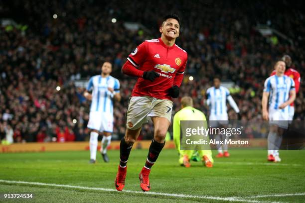 Alexis Sanchez of Manchester United celebrates after scoring his sides second goal during the Premier League match between Manchester United and...