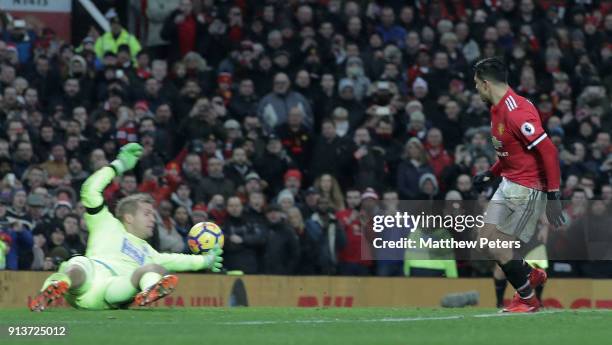 Alexis Sanchez of Manchester United scores their second goal during the Premier League match between Manchester United and Huddersfield Town at Old...