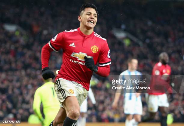 Alexis Sanchez of Manchester United celebrates after scoring his sides second goal during the Premier League match between Manchester United and...