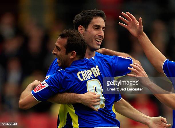 Cardiff City's Peter Whittingham celebrates scoring the opening goal from the penalty spot with team mate Michael Chopra during the Watford and...