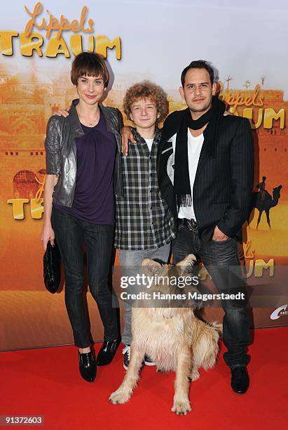 Actress Christiane Paul, Karl Alexander Seidel, Moritz Bleibreu and dog - Muck attend the premiere 'Lippels Traum' at the MaxxX Filmpalast on October...