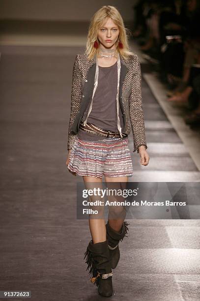 Model walks the runway during the Isabel Marant Spring Summer 2010 Pret a Porter show as part of the Paris Womenswear Fashion Week Spring/Summer 2010...