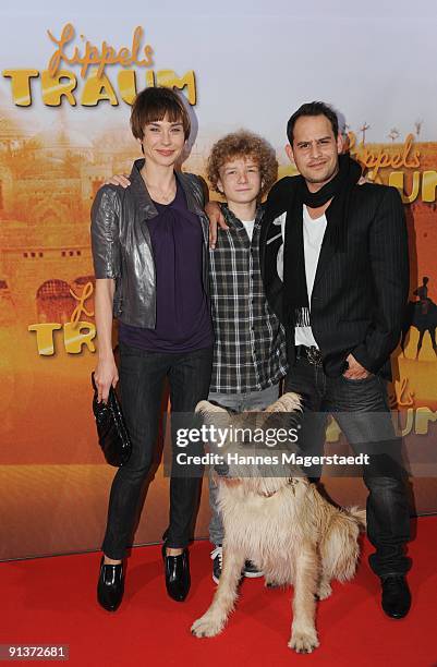 Actress Christiane Paul, Karl Alexander Seidel, Moritz Bleibreu and dog - Muck attend the premiere 'Lippels Traum' at the MaxxX Filmpalast on October...