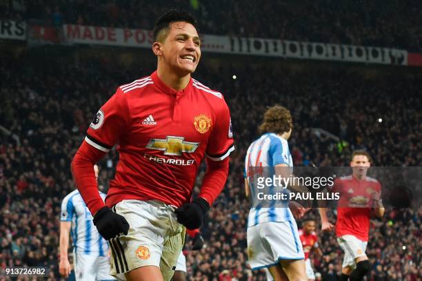 Manchester United's Chilean striker Alexis Sanchez celebrates scoring their second goal during the English Premier League football match between...