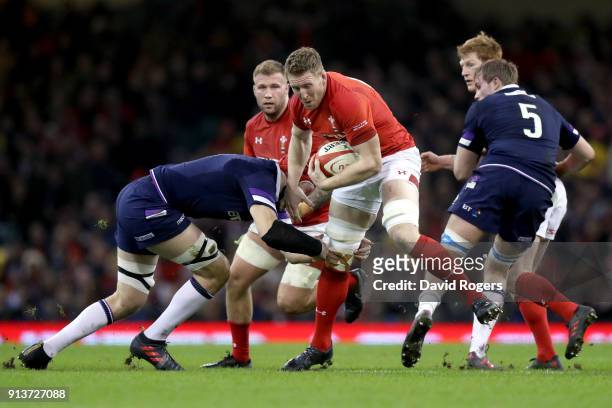Bradley Davies of Wales runs with the ball during the Natwest Six Nations round One match between Wales and Scotland at Principality Stadium on...