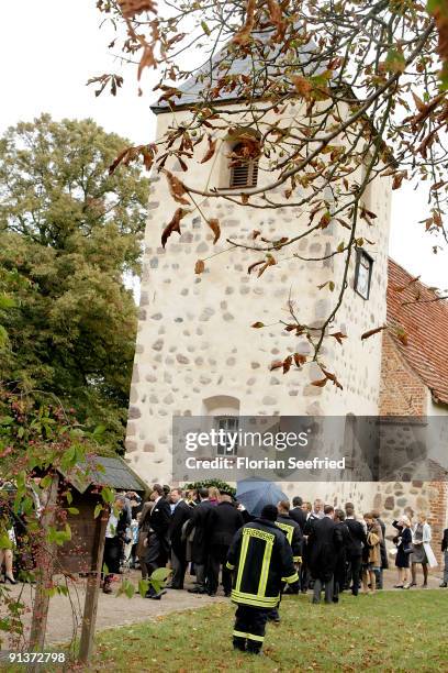 Guests leave the church wedding of Barbara Schoeneberger and Maximilian von Schierstaedt at the church of Rambow on October 3, 2009 in Rambow,...