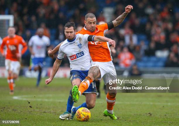 Blackpool's Kyle Vassell battles with Bury's Phil Edwards during the Sky Bet League One match between Bury and Blackpool at Gigg Lane on February 3,...