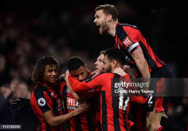 Lys Mousset of AFC Bournemouth celebrates scoring his side's second goal with team mates during the Premier League match between AFC Bournemouth and...