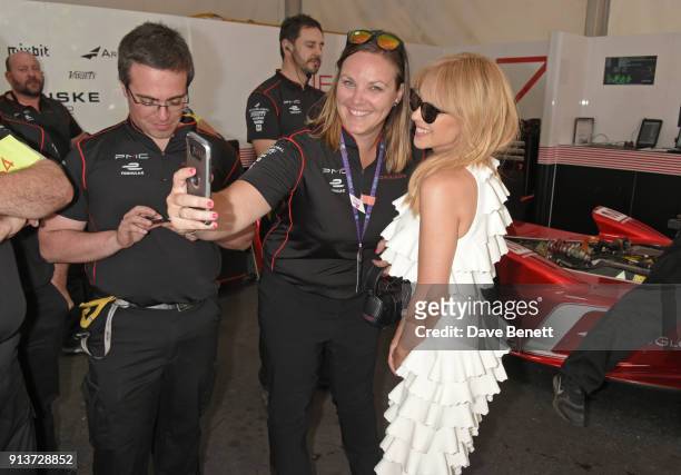 Kylie Minogue poses with members of the Dragon Racing team at the ABB FIA Formula E Antofagasta Minerals Santiago E-Prix on February 3, 2018 in...