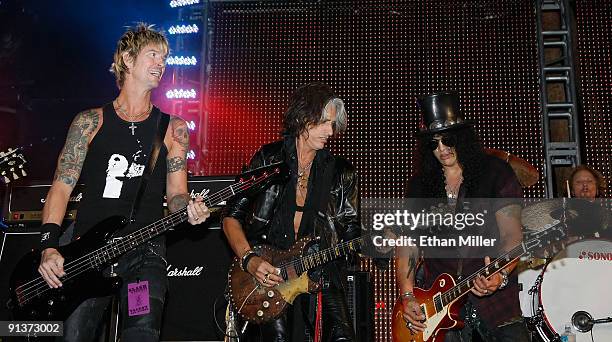 Bassist Duff McKagan, Aerosmith guitarist Joe Perry, guitarist Slash and drummer Matt Sorum perform during a concert at the Bare Pool Lounge at The...