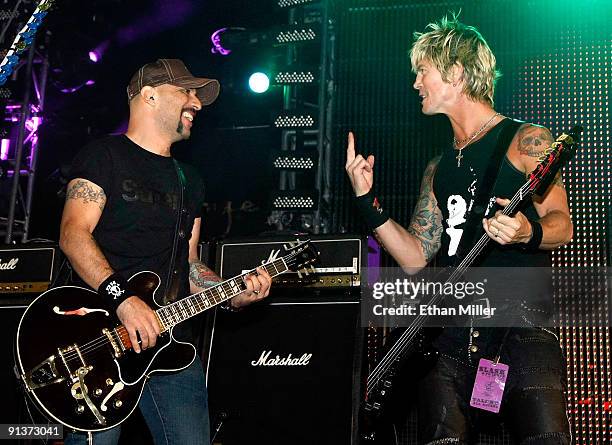 Guitarist Dave Kushner and bassist Duff McKagan perform during a concert at the Bare Pool Lounge at The Mirage Hotel & Casino to celebrate the...