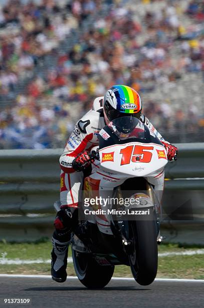 Alex De Angelis of Rep. San Marino and San Carlo Honda Gresini tries the start at the end of the qualifying practice session ahead of the MotoGP of...