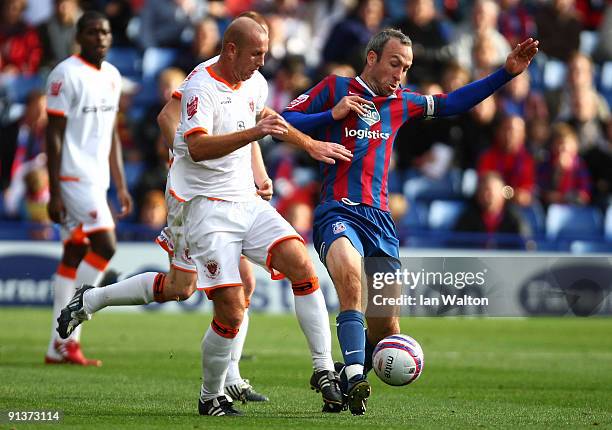 Stephen Crainey of Blackpool tackles Shaun Derry of Crystal Palace during the Coca Cola Championship match between Crystal Palace and Blackpool at...