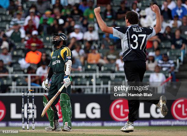 Mohammad Yousuf of Pakistan is bowled by Kyle Mills of New Zealand during the ICC Champions Trophy 2nd Semi Final match between New Zealand and...